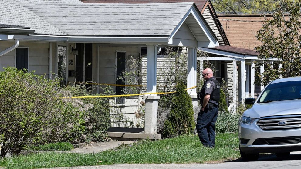 PHOTO: A Louisville Metro Police officer stands outside of the home of the suspected shooter in the Camp Taylor neighborhood in Louisville, Ky., April 10, 2023.