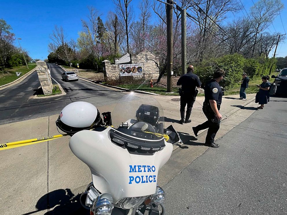 PHOTO: Metro Nashville Police Department officers walk outside of Covenant School, Covenant Presbyterian Church, in Nashville, March 27, 2023.
