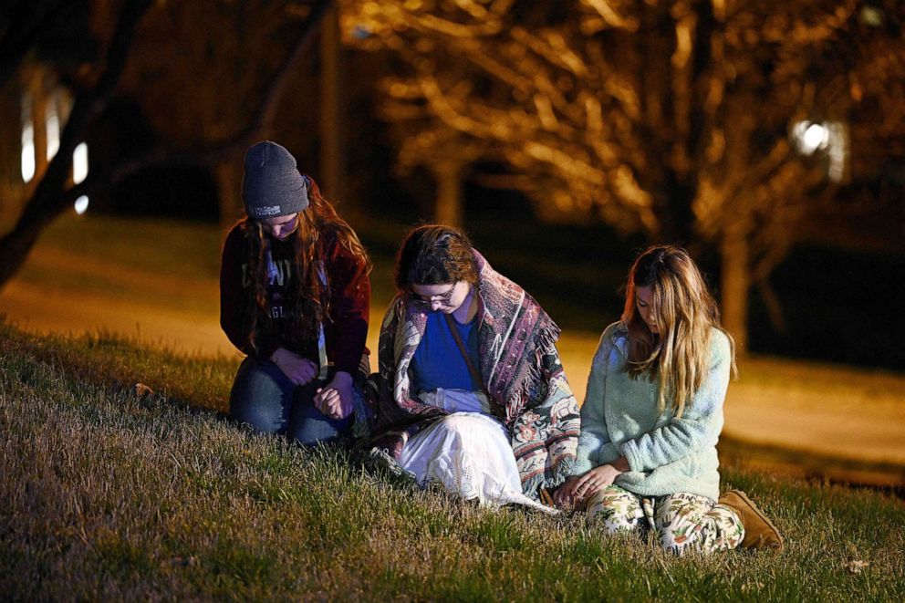 PHOTO: Children gather outside the Covenant School building at the Covenant Presbyterian Church following a shooting, in Nashville, Tennessee, March 27, 2023.