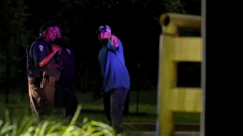 Authorities investigate the scene after a deadly shooting at Ben E. Keith distribution center, Aug. 20, 2018, in Missouri City, Texas.