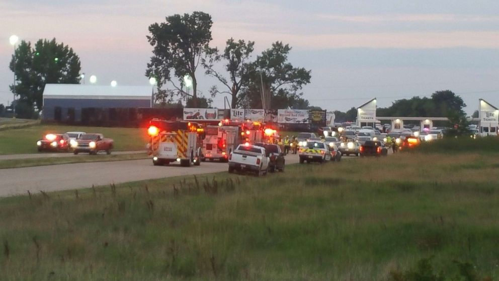 Emergency response vehicles gather at Great Lakes Dragaway, Aug. 13, 2017, near Union Grove, Wis. Three men were shot and killed during an auto racing event at the facility, a Wisconsin sheriff said. 