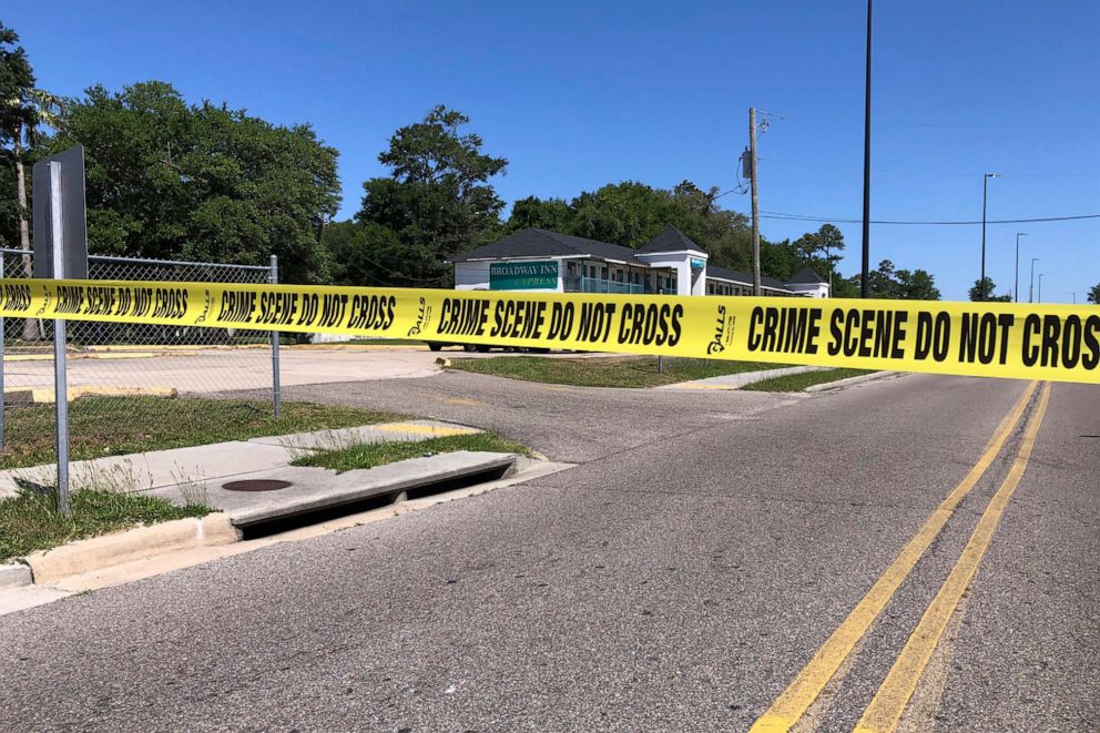 PHOTO: A police crime scene tape sections off the area surrounding the Biloxi Broadway Inn Express, in Biloxi, Miss, April 27, 2022.