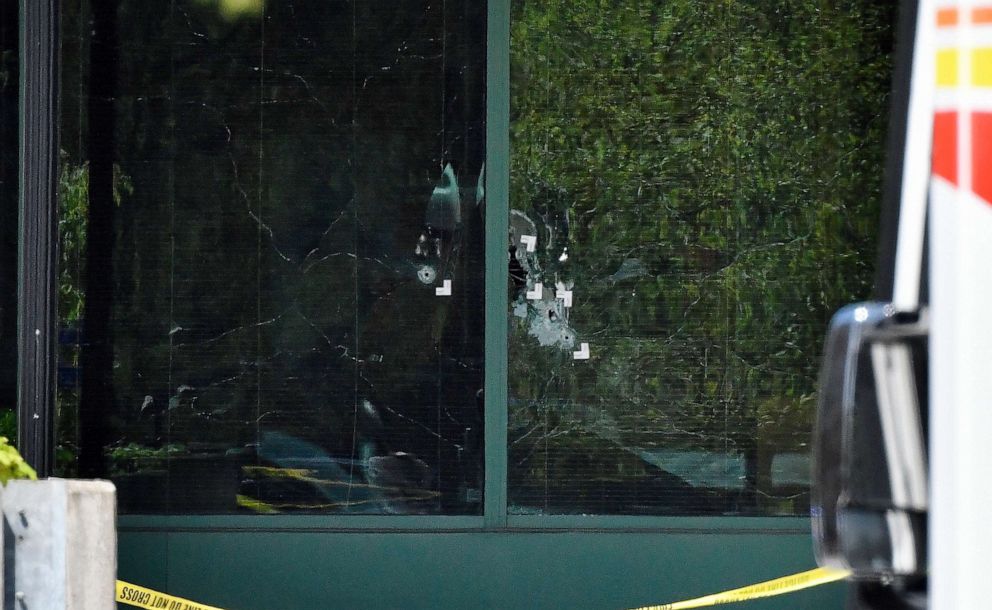 PHOTO: Bullet holes are seen in the front windows of the Old National Bank building in Louisville, Ky., April 10, 2023.