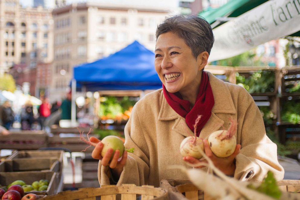 PHOTO: An undated photo shows a woman Shopping For vegetables at a public market.