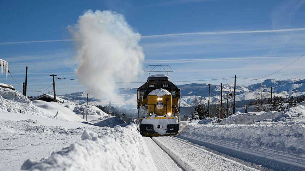 PHOTO: A view of Union Pacific Train moves as the railroad covered with snow, March 2, 2023, in Truckee, Calif.