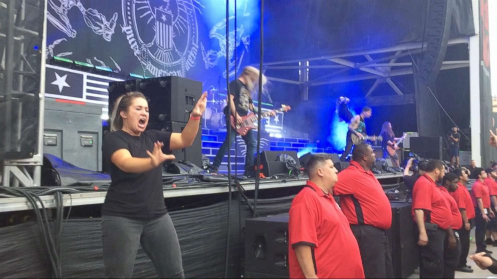 VIDEO: Sign language interpreter rocks out at heavy metal concert  