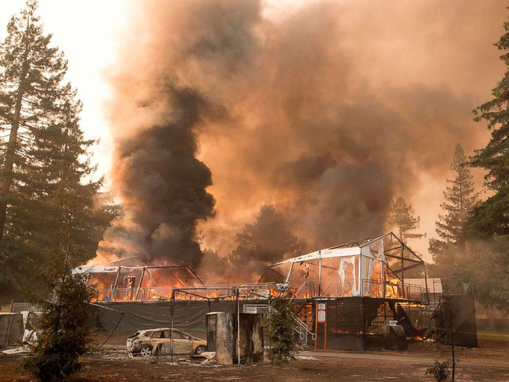 PHOTO: A tent structure built for the 2017 Safeway Open burns on a golf course at the Silverado Resort and Spa in Napa, Calif., Oct. 9, 2017, as multiple wind-driven fires continue to whip through the region.
