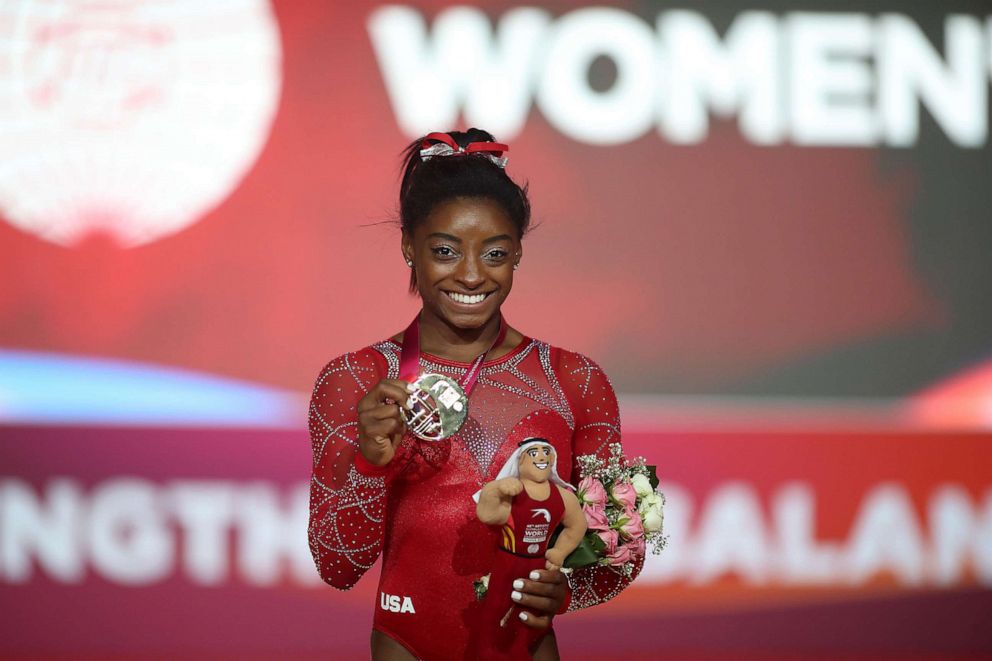 PHOTO: In this file photo taken on November 3, 2018, Gold medalist Simone Biles poses during the 2018 FIG Artistic Gymnastics Championships in Doha.