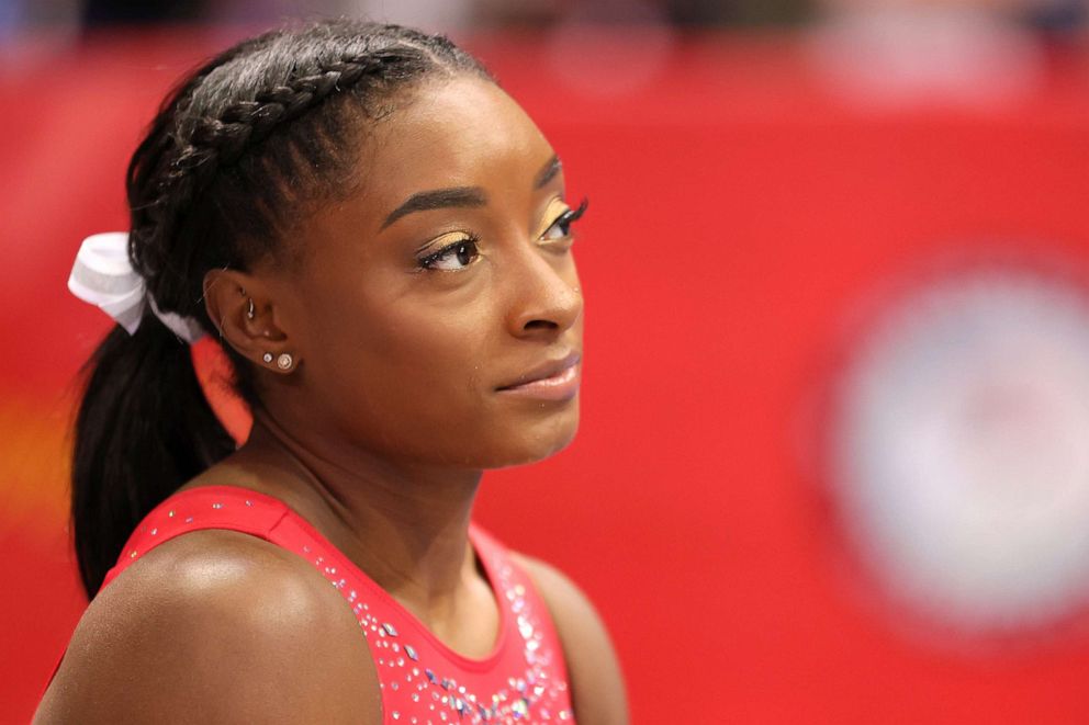 PHOTO: Simone Biles looks on during warm ups prior to the Women's competition of the 2021 U.S. gymnastics Olympic trials in St. Louis, June 27, 2021.