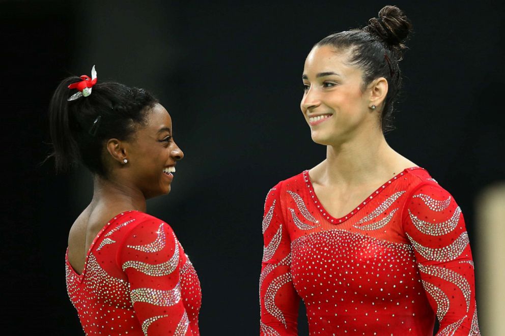 PHOTO: Aly Raisman and Simone Biles look on during an artistic gymnastics training session on Aug. 4, 2016 at the Arena Olimpica do Rio in Rio de Janeiro.