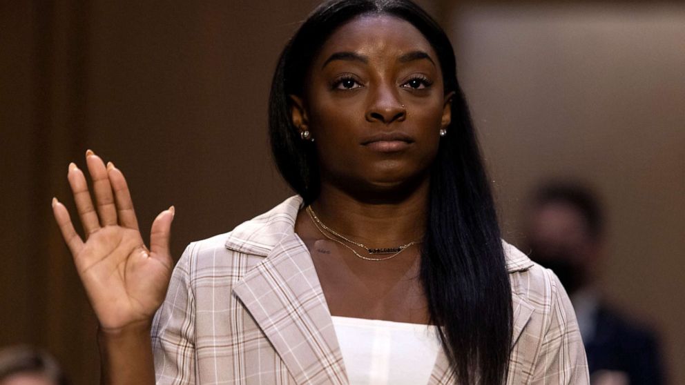 PHOTO: U.S. Olympic gymnast Simone Biles is sworn in during a Senate Judiciary hearing about the Larry Nassar sexual abuse investigation on Sept. 15, 2021, in Washington, D.C.