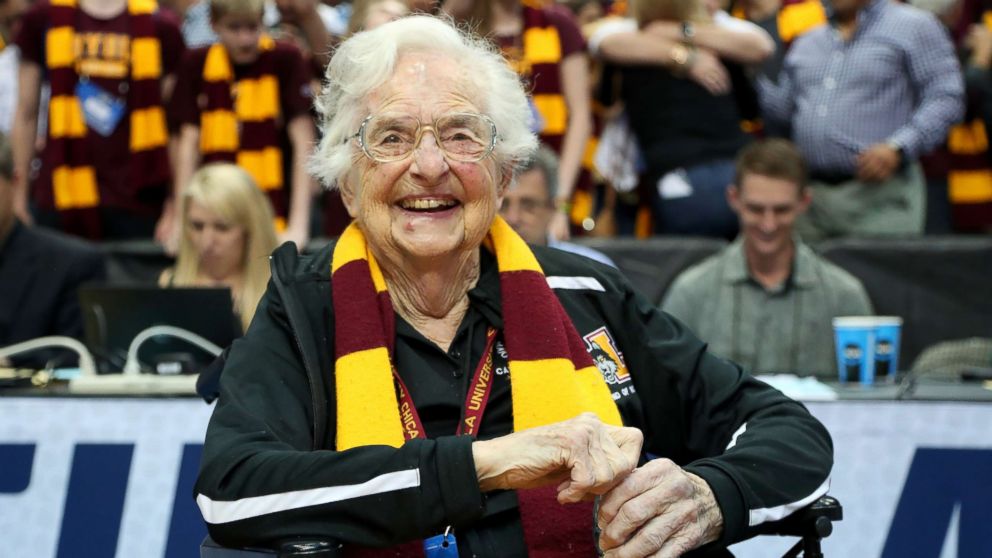 PHOTO: Sister Jean Dolores-Schmidt celebrates after the Loyola Ramblers beat the Tennessee Volunteers 63-62 in the second round of the 2018 NCAA Tournament at the American Airlines Center, March 17, 2018 in Dallas.