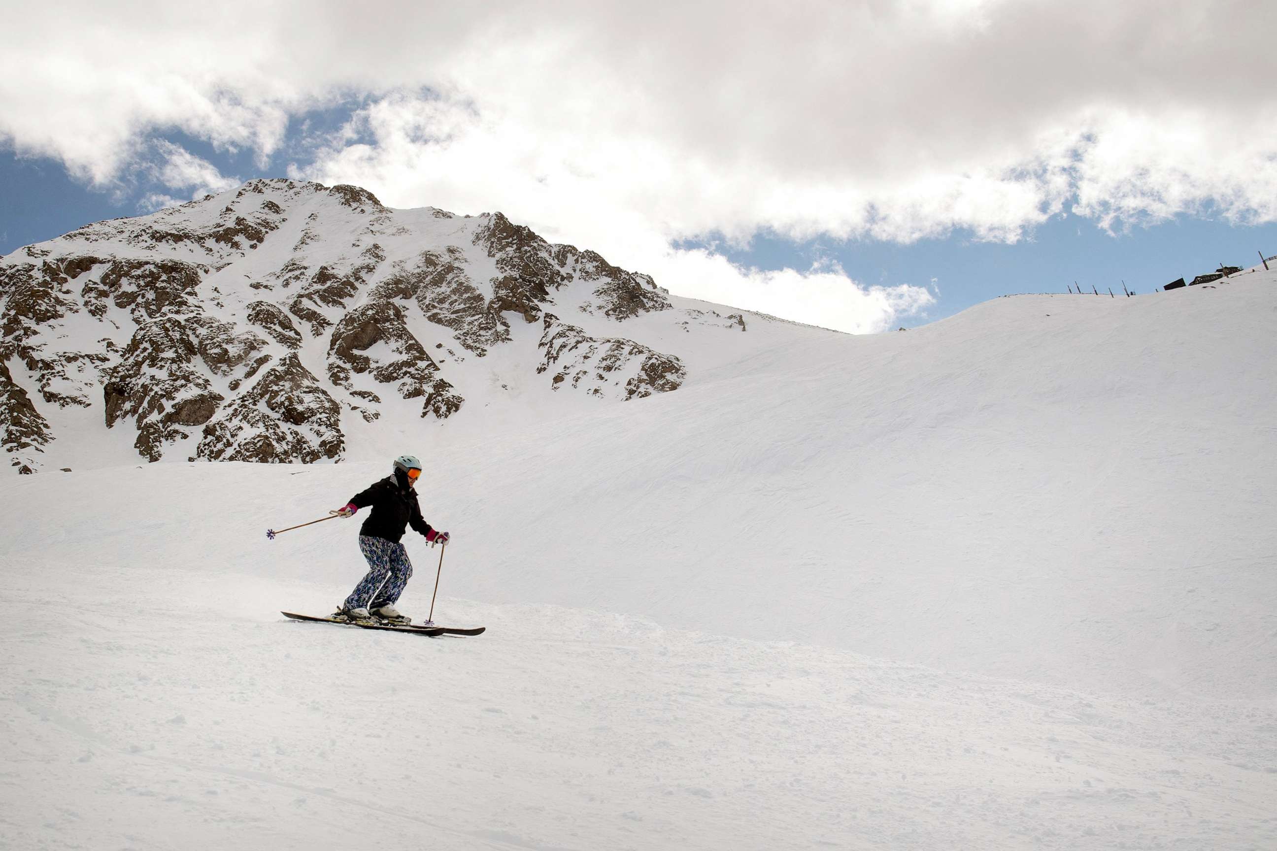 PHOTO: A skier carves turns at Arapahoe Basin in Summit County, Colo., April 2, 2023.