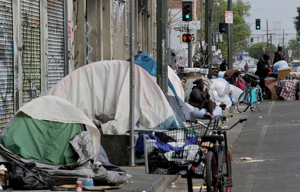 PHOTO: Tents housing the homeless line the streets in the Skid Row community of Los Angeles, April 26, 2021.