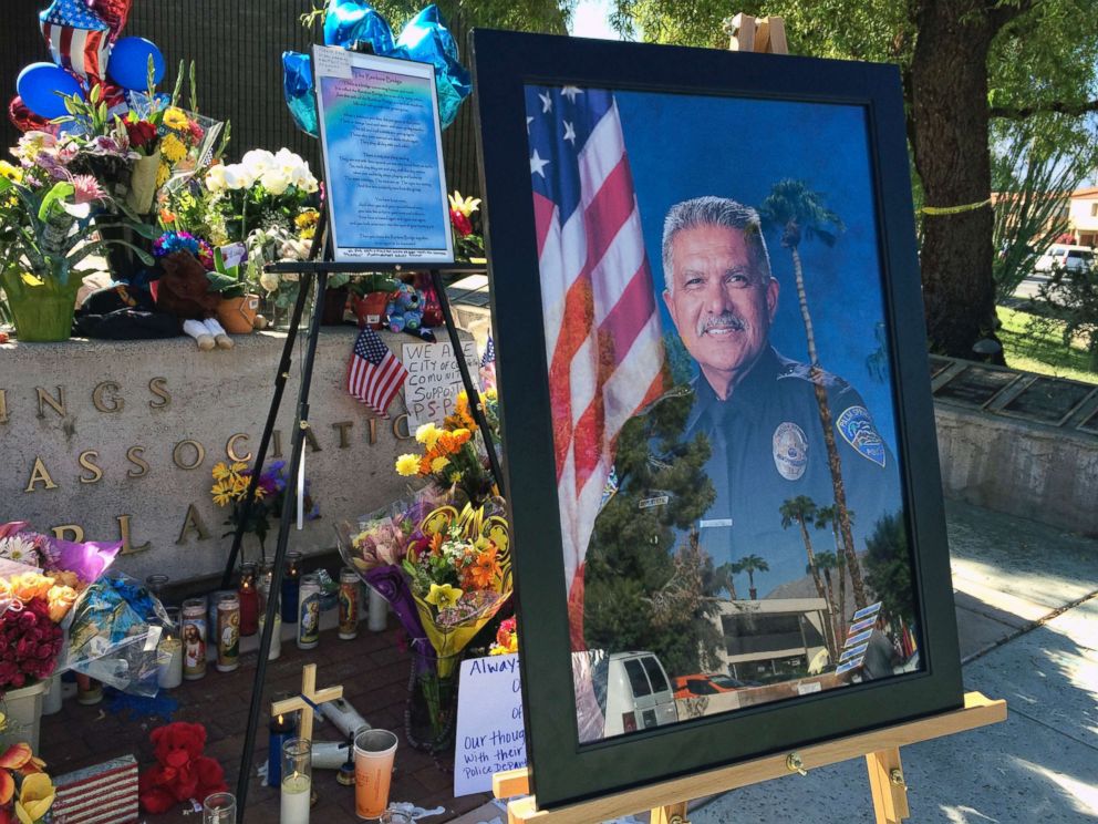 PHOTO: A photo of Palm Springs Police Officer Jose Gil Gilbert Vega is seen at a memorial for Vega and police officer Lesley Zerebny in front of the police station in Palm Springs, Calif., Oct. 10, 2016.