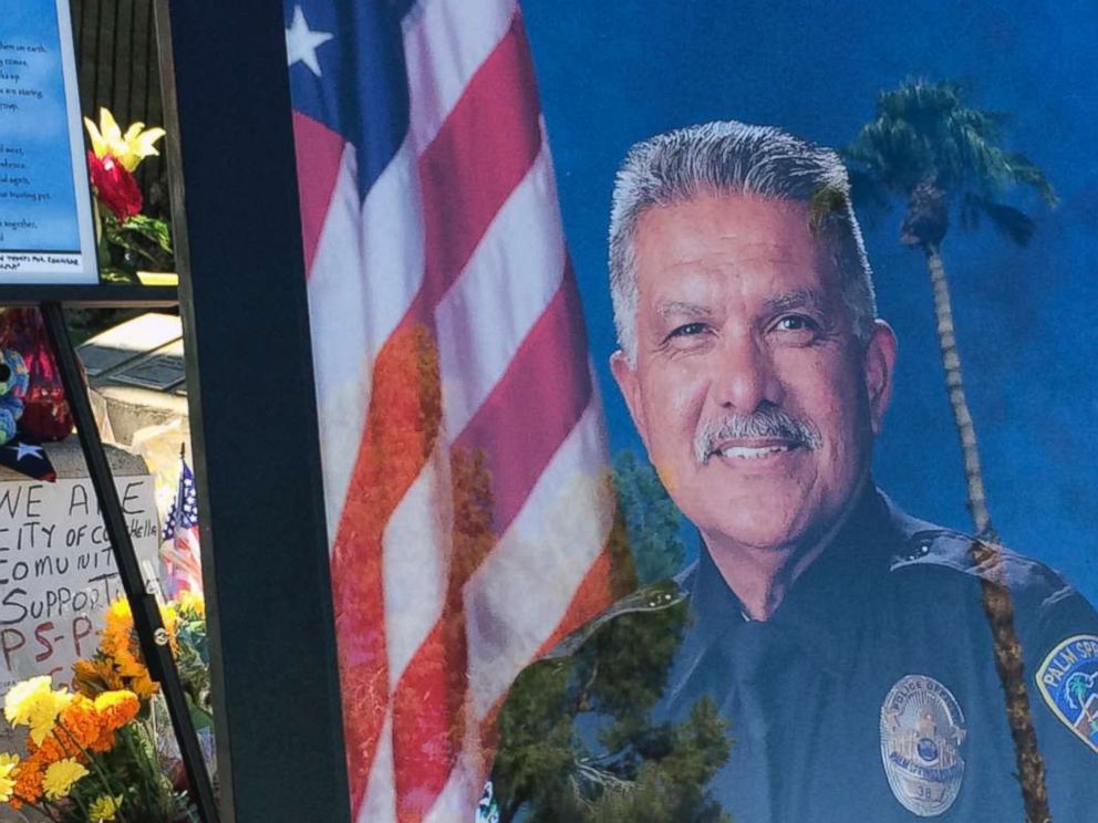PHOTO: A photo of Palm Springs Police Officer Jose "Gil" Gilbert Vega is seen at a memorial for Vega and police officer Lesley Zerebny in front of the police station in Palm Springs, Calif., Oct. 10, 2016.
