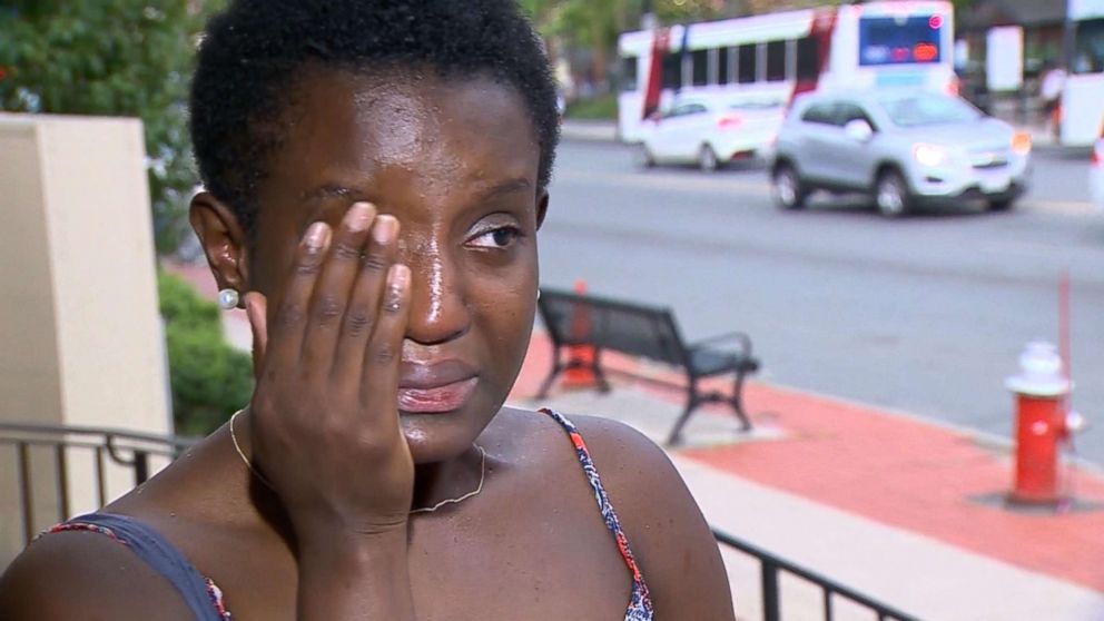 PHOTO: Oumou Kanoute wipes away a tear while talking to a reporter about an incident where a person called campus police to report her for looking out of place at Smith College in Northampton, Mass.