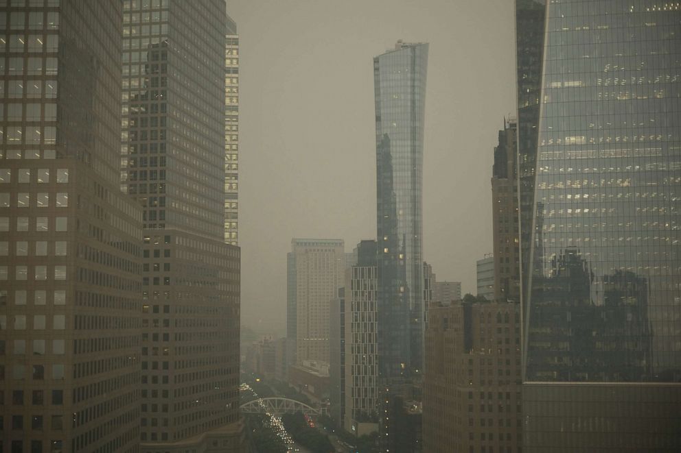 PHOTO: Buildings in lower Manhattan in New York are partially obscured by smoke from Canadian wildfires on June 6, 2023.