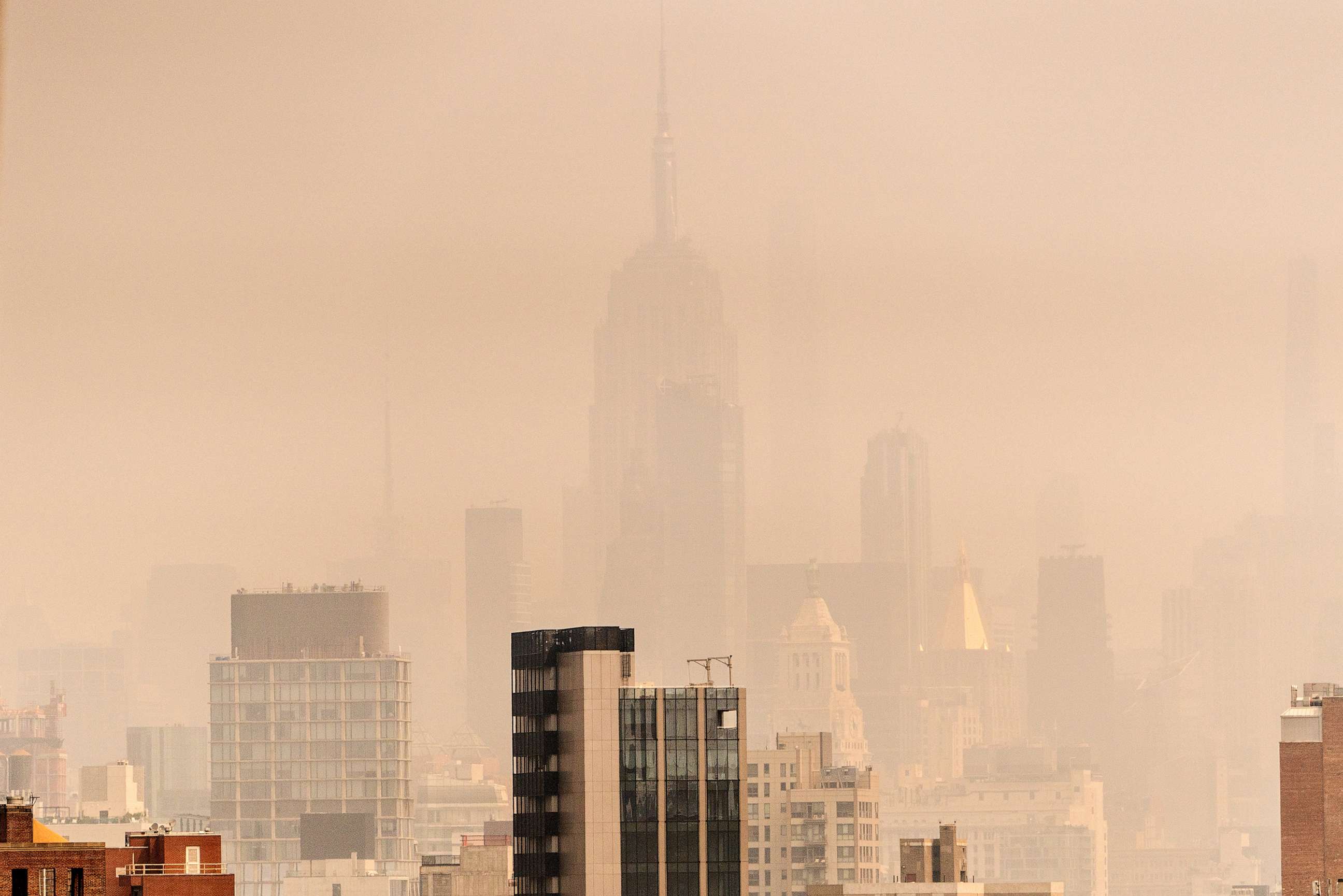 PHOTO: Smoke from wildfires in Canada shrouds the Empire State Building on June 30, 2023 in New York City.