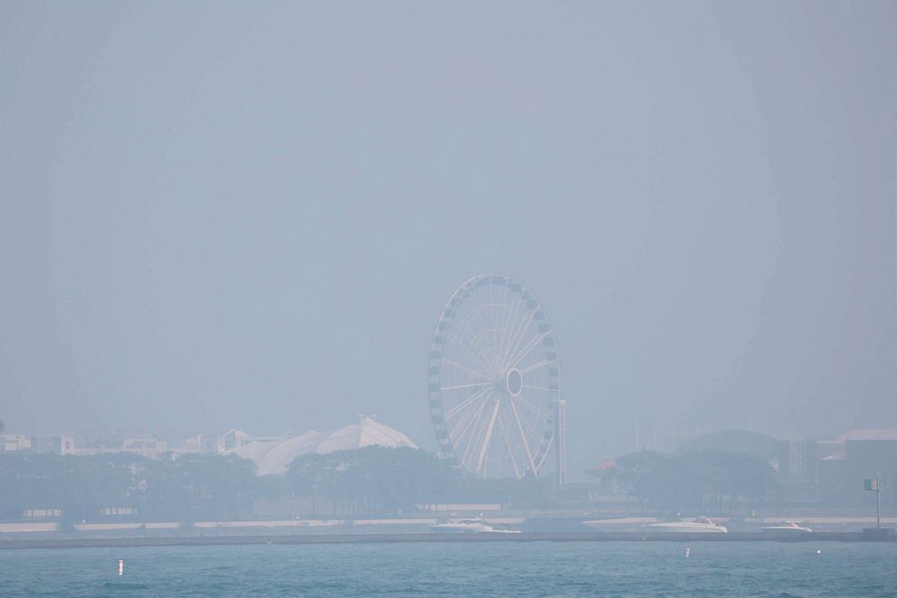 PHOTO: Wildfire smoke covers the ferris wheel on Navy Pier on June 28, 2023 in Chicago.