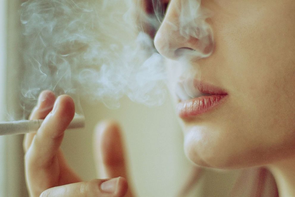 PHOTO: A young woman smoking a cigarette is pictured in this undated stock photo.