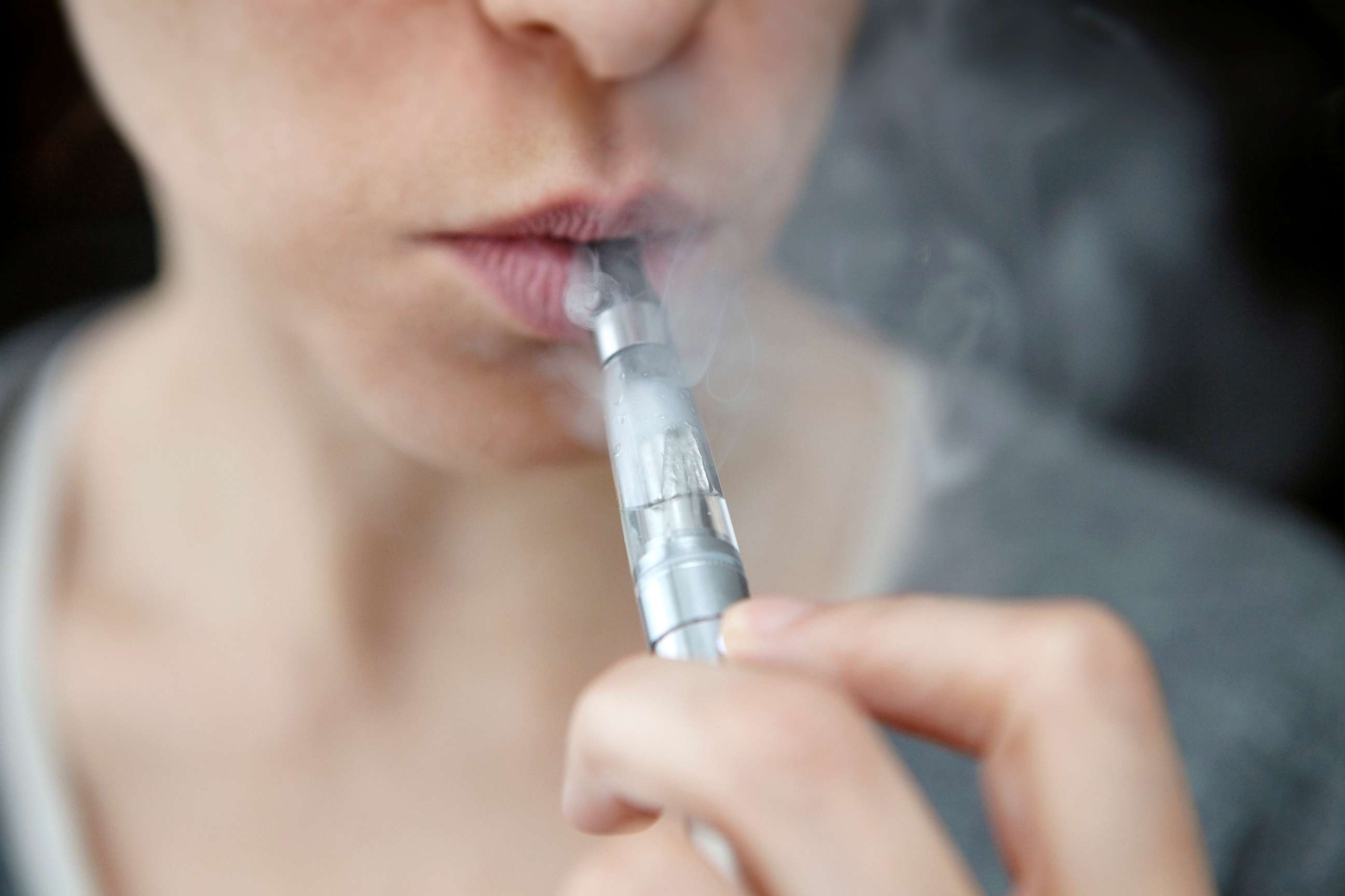 PHOTO: In this undated stock photo shows a person smoking an electronic cigarette.