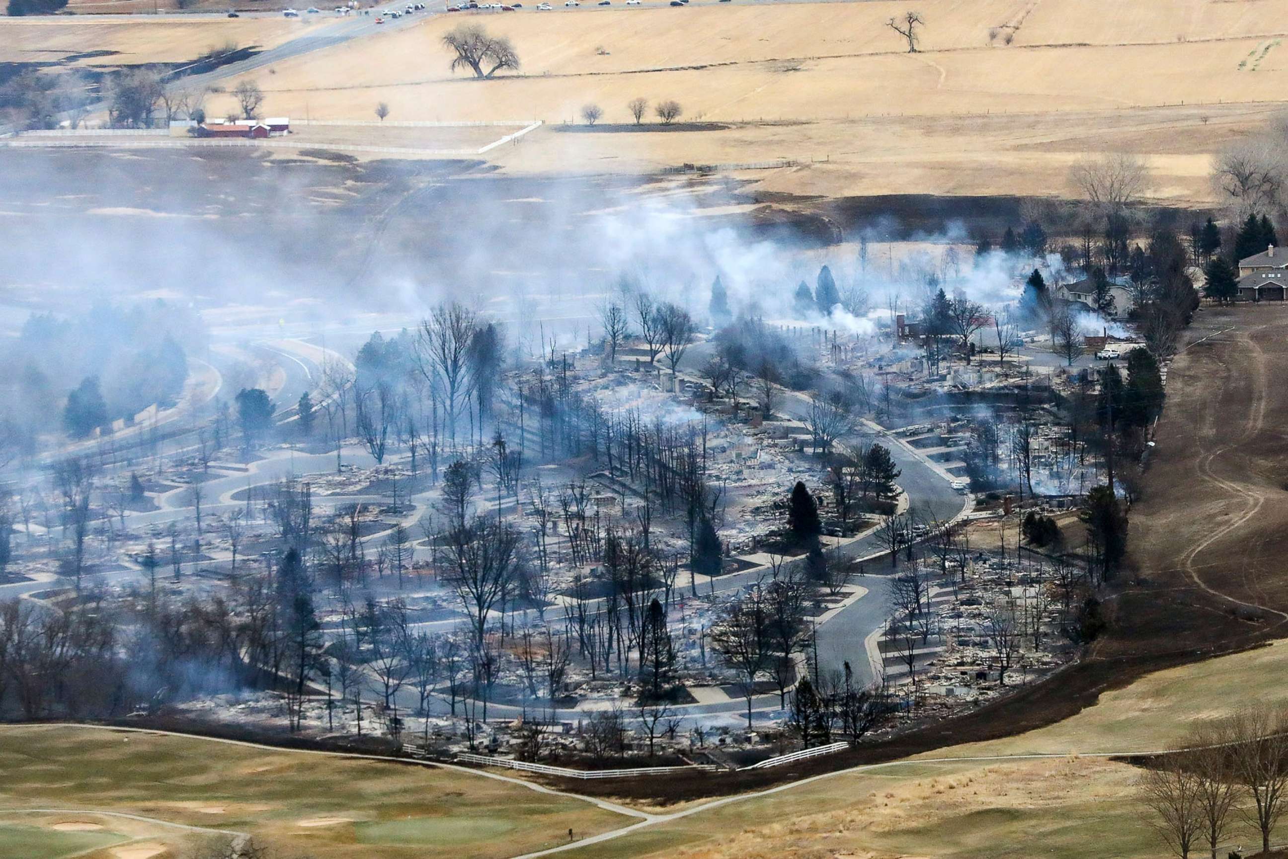 PHOTO: A Boulder County neighborhood smolders after it was was destroyed by a wildfire, Dec. 31, 2021.
