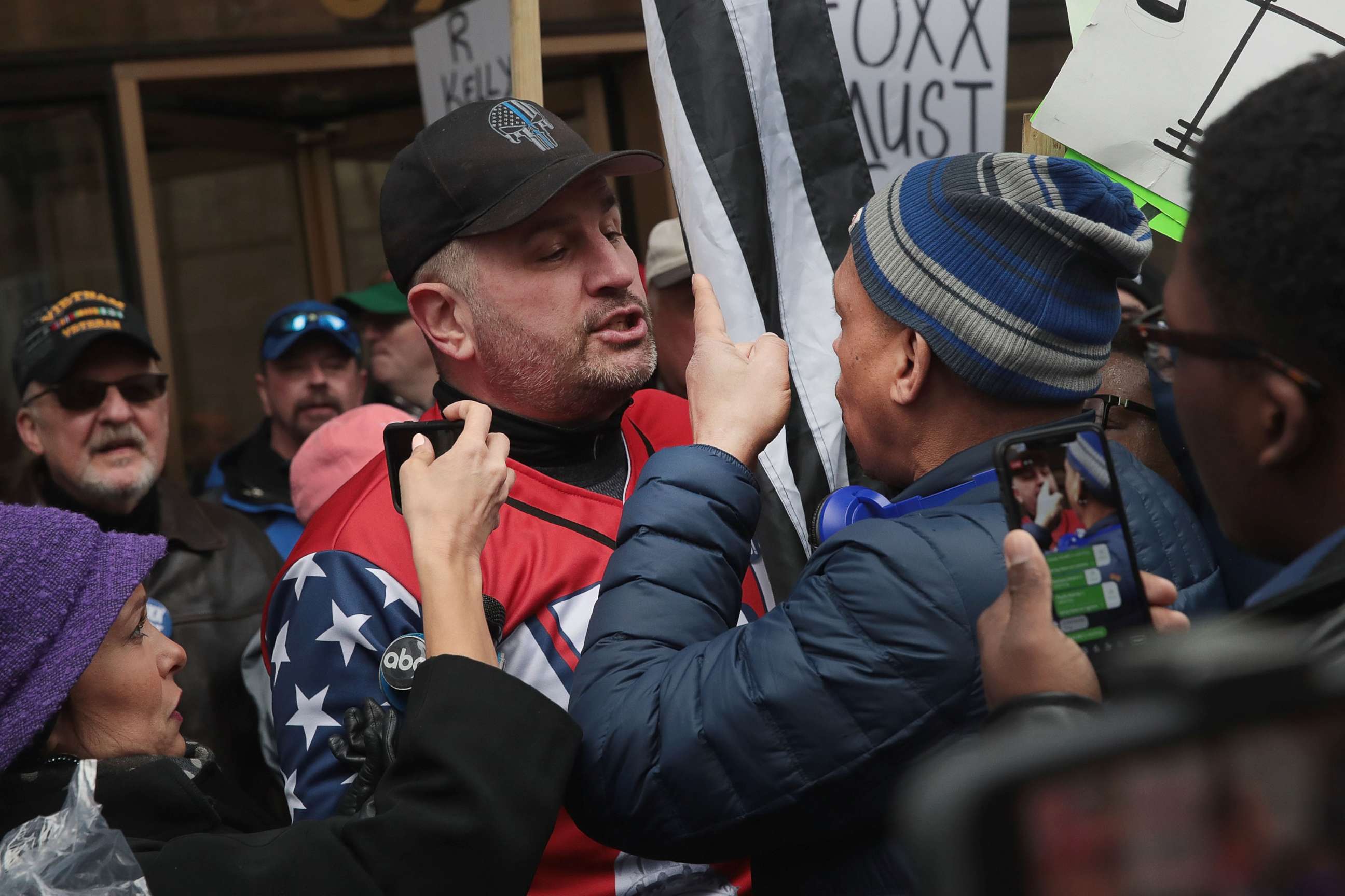 PHOTO: Opposing sides argue during a demonstration organized by the Fraternal Order of Police to call for Foxx's removal, April 01, 2019, in Chicago. 