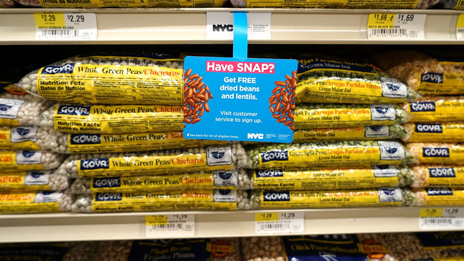 PHOTO: A sign at a grocery store informs customers of free food offers for participants of the Supplemental Nutrition Assistance Program (SNAP.)