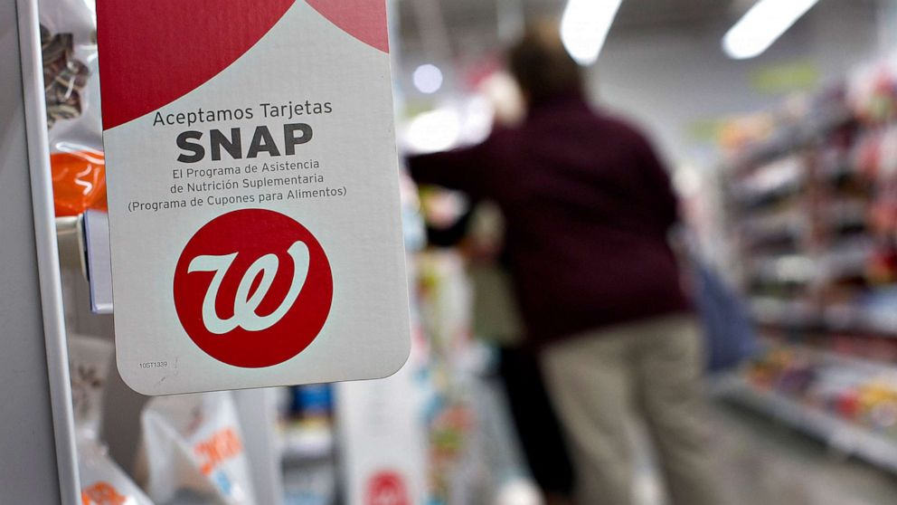 PHOTO: A sign advertising the acceptance of Supplemental Nutritional Assistance Program (SNAP) cards is displayed at a Walgreen Co. store in Chicago, March 23, 2012.