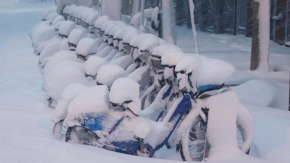 PHOTO: Snow piles up on a row of Citibike bicycles during a snowstorm in Hoboken, NJ, Feb. 23, 2026.