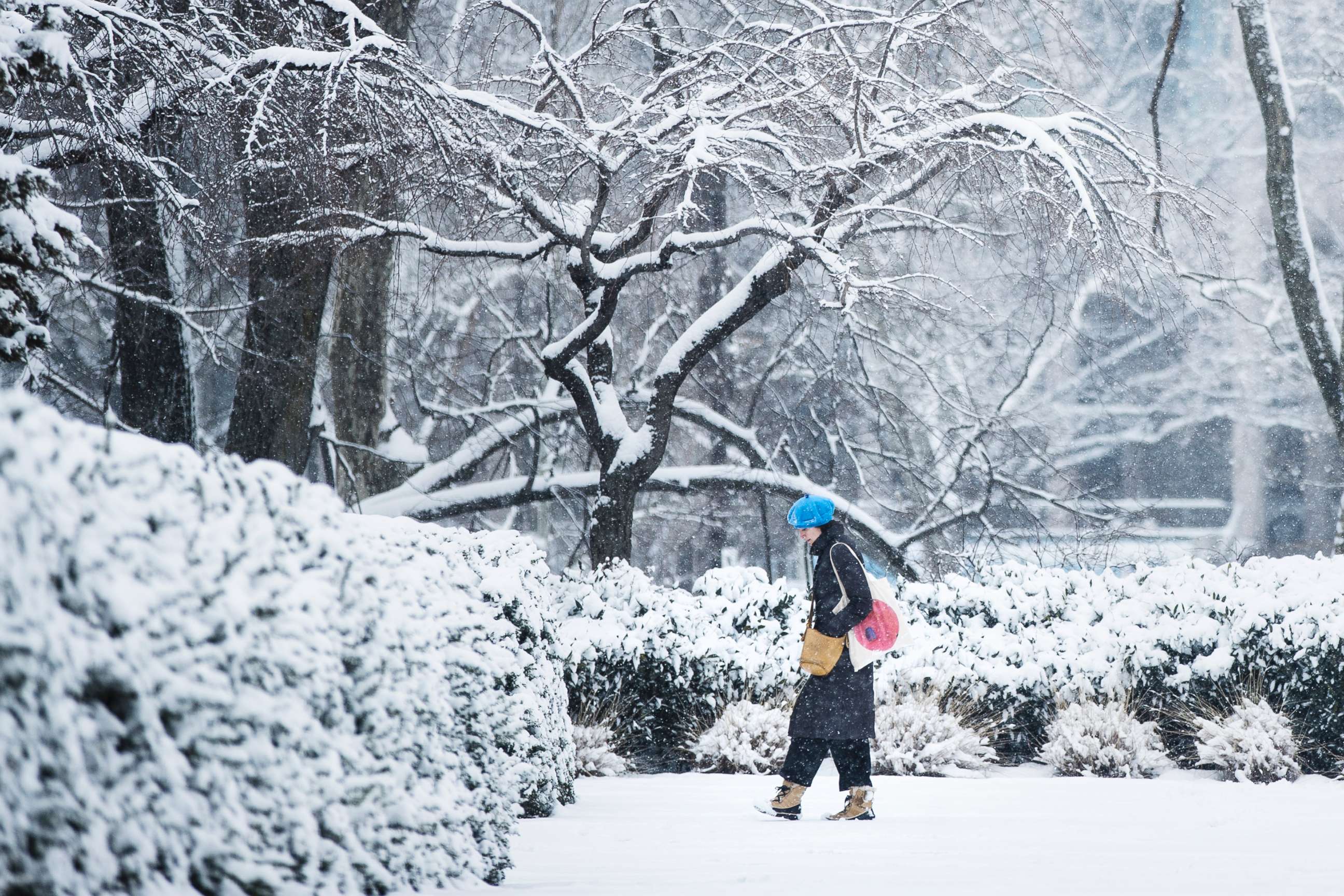 PHOTO: A woman walks in the snow at the Philadelphia Museum of Art in Philadelphia, March 1, 2019.