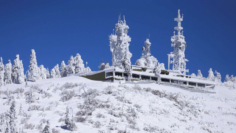 PHOTO: Ice covers communication towers as massive amounts of snow trap residents of mountain towns in San Bernadino County, Crestline, Calif., March 2, 2023.
