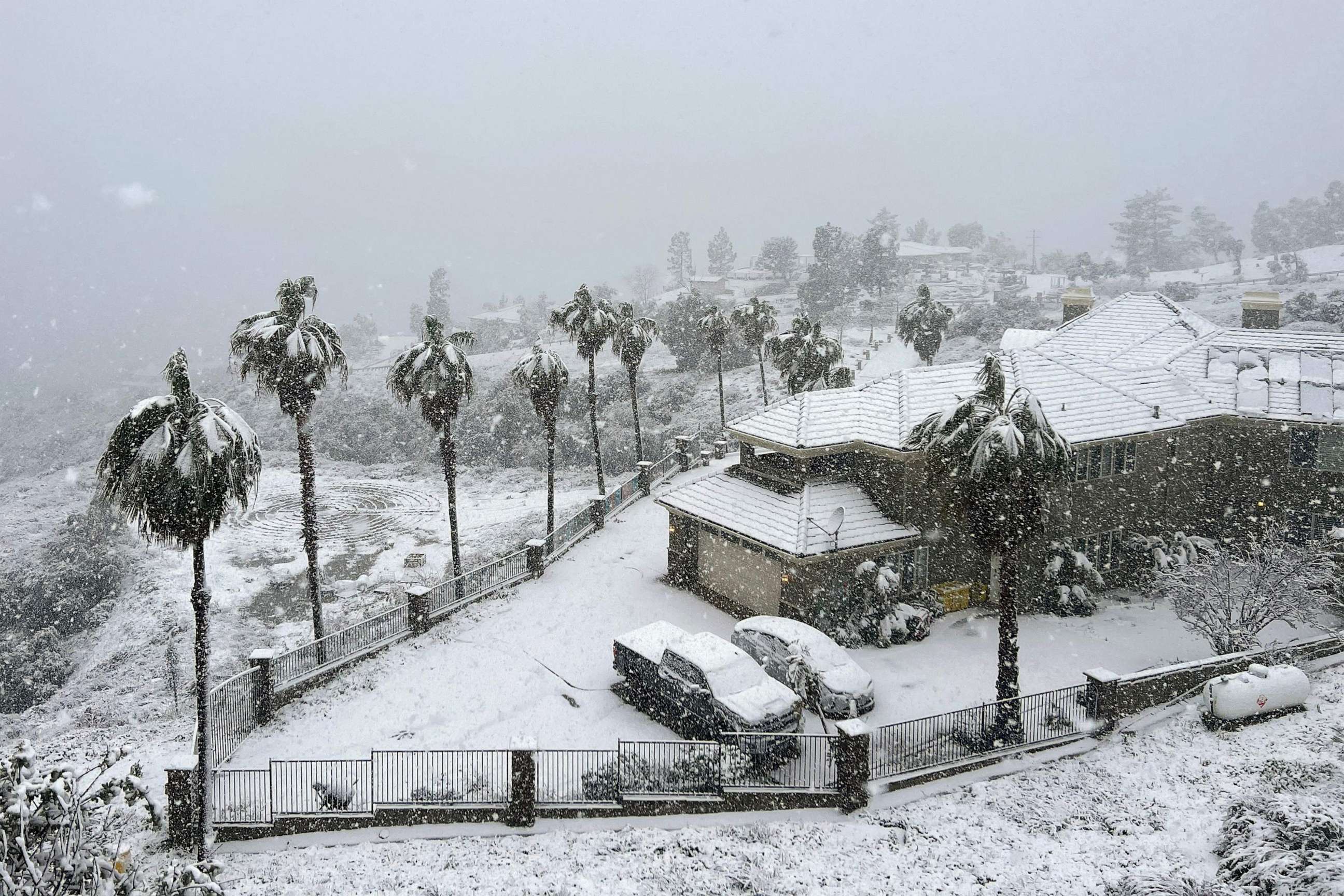 PHOTO: Snow blankets a home in Rancho Cucamonga, Calif., on Feb. 25, 2023.