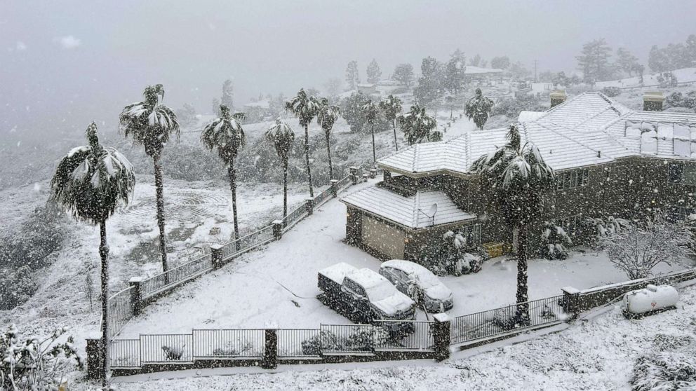 PHOTO: Snow blankets a home in Rancho Cucamonga, Calif., on Feb. 25, 2023.