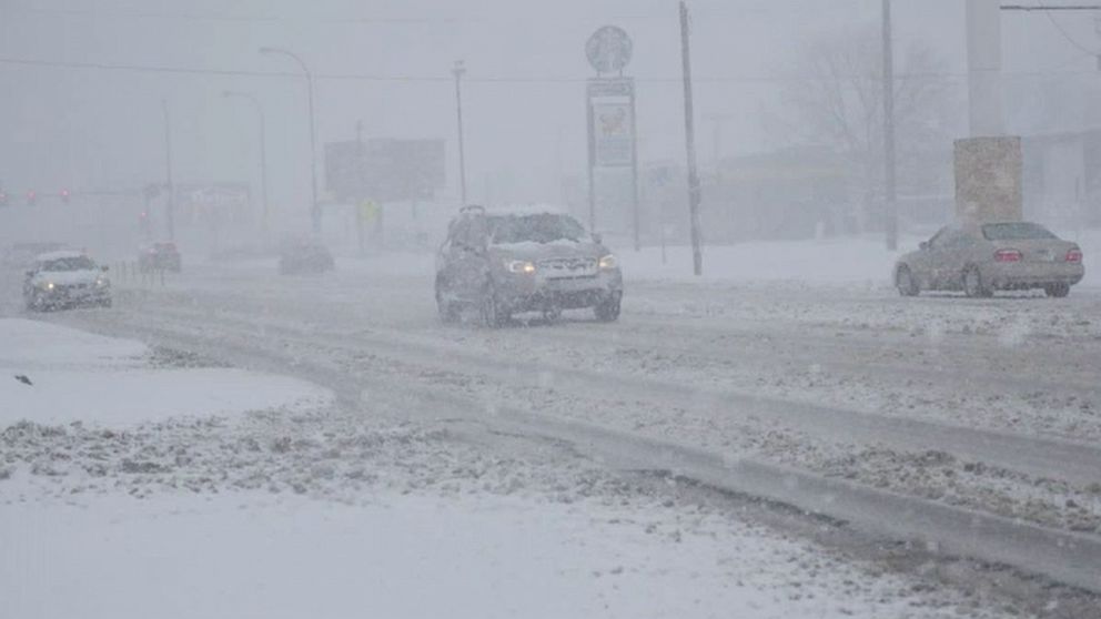 PHOTO: A spring blizzard blankets the area with snow in Grand Forks, N.D., on April 12, 2022. 