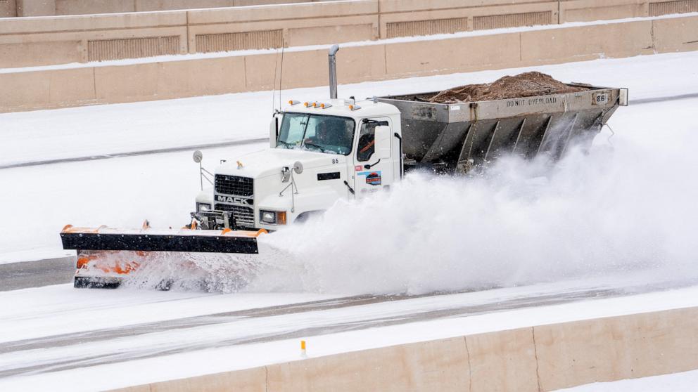 PHOTO: A plow truck clears snow on I-40 during Winter Storm Fern in Oklahoma City, Oklahoma, Jan. 24, 2026.