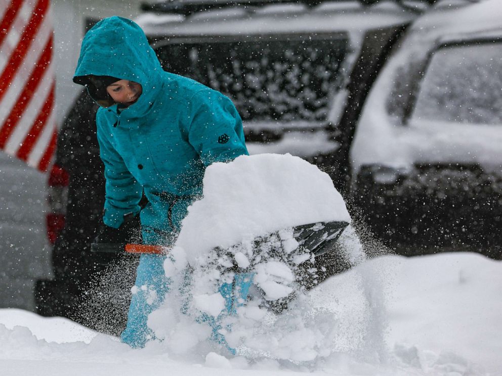 PHOTO: Jordan Dickman, 17, shovels some of the 11 inches of snow that fell on Nov. 26, 2019, in Denver.