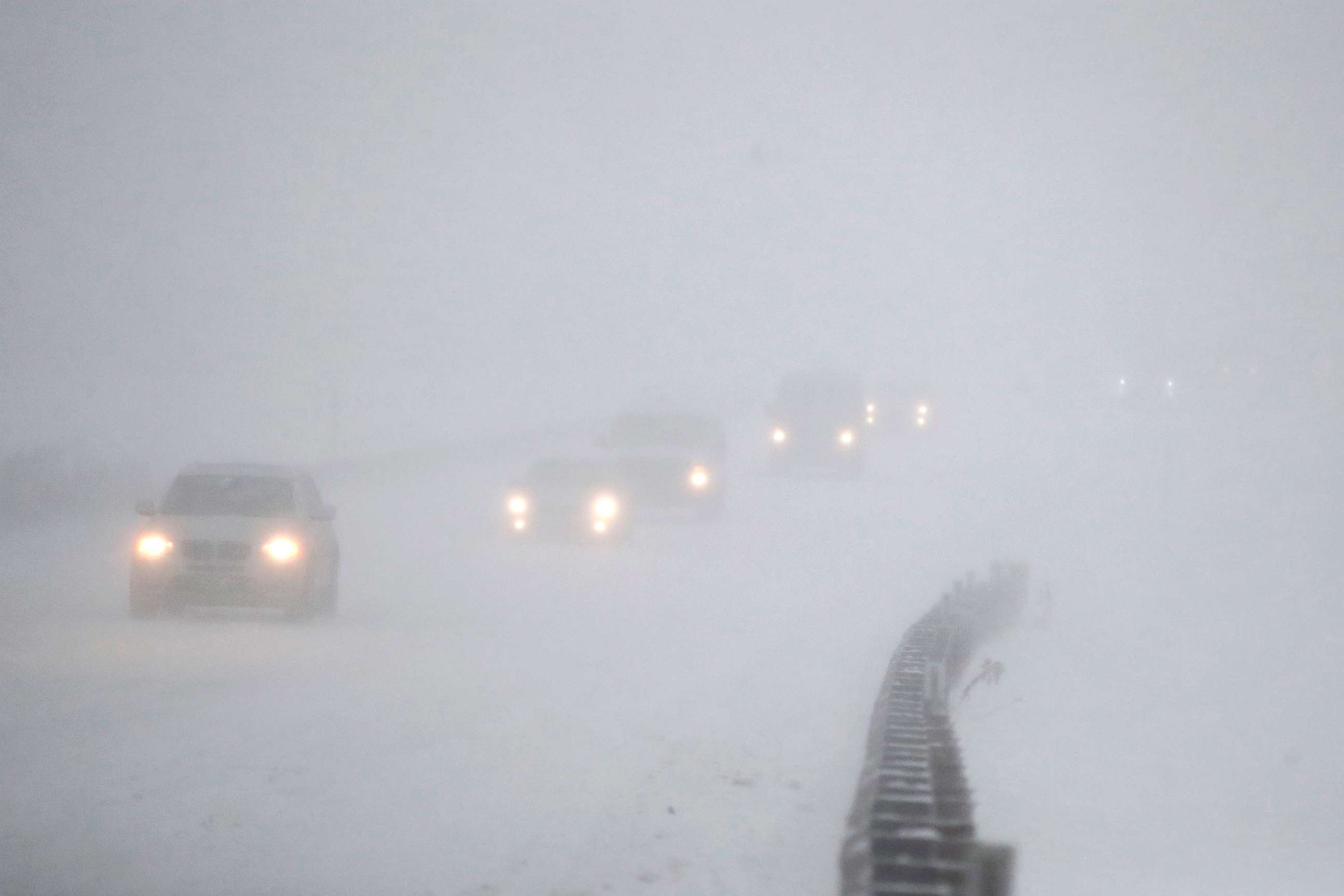 PHOTO: Vehicles commute southbound on the Garden State Parkway in whiteout conditions during a snowstorm, Jan. 4, 2018, in Eatontown, N.J. 