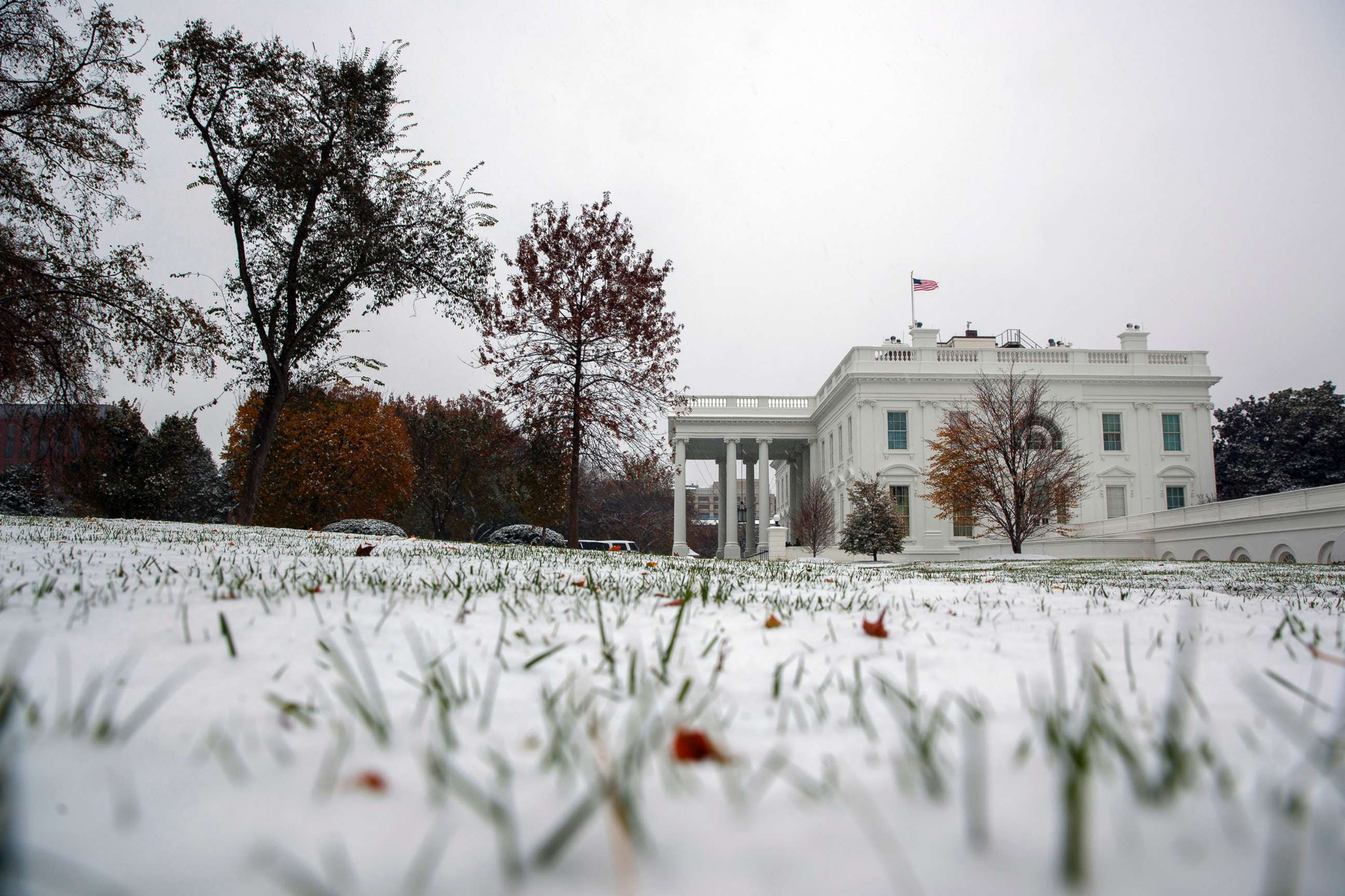 PHOTO: Snow covers the grass outside the White House, Nov. 15, 2018, in Washington.