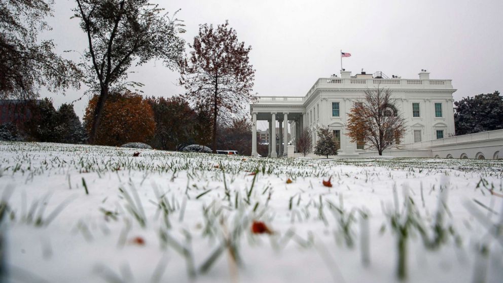 PHOTO: Snow covers the grass outside the White House, Nov. 15, 2018, in Washington.
