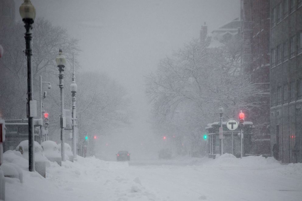 PHOTO: A nearly empty Dartmouth Street as a snow, Dec. 17, 2020 in Boston.