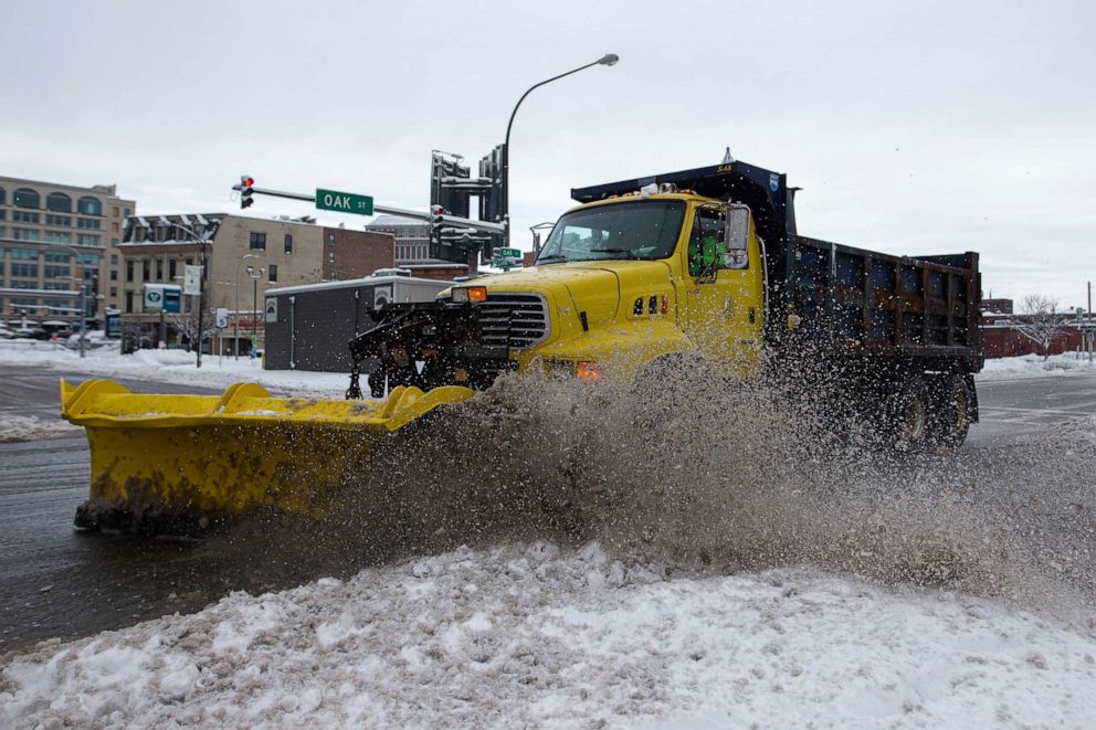 PHOTO: A snow plow clears snow from the road on Friday, Nov. 18, 2022, in Buffalo, N.Y.