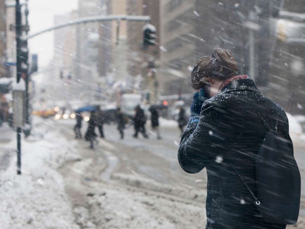 PHOTO: A woman walks in the snow in an undated stock photo. 