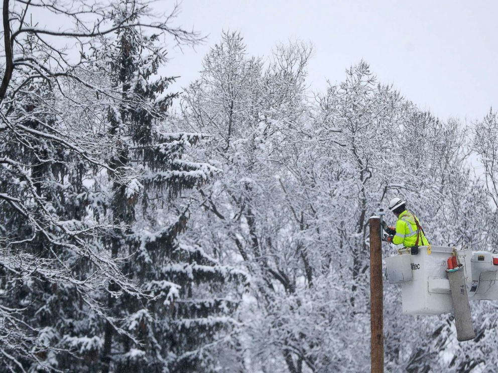 PHOTO: Phil Blair, a utility worker with PotomacEdison out of West Virginia, works on setting up a new power line as a crew works on restoring power along Molly Stark Drive ahead of a winter storm, Wednesday, March 7, 2018, in Morristown, N.J.