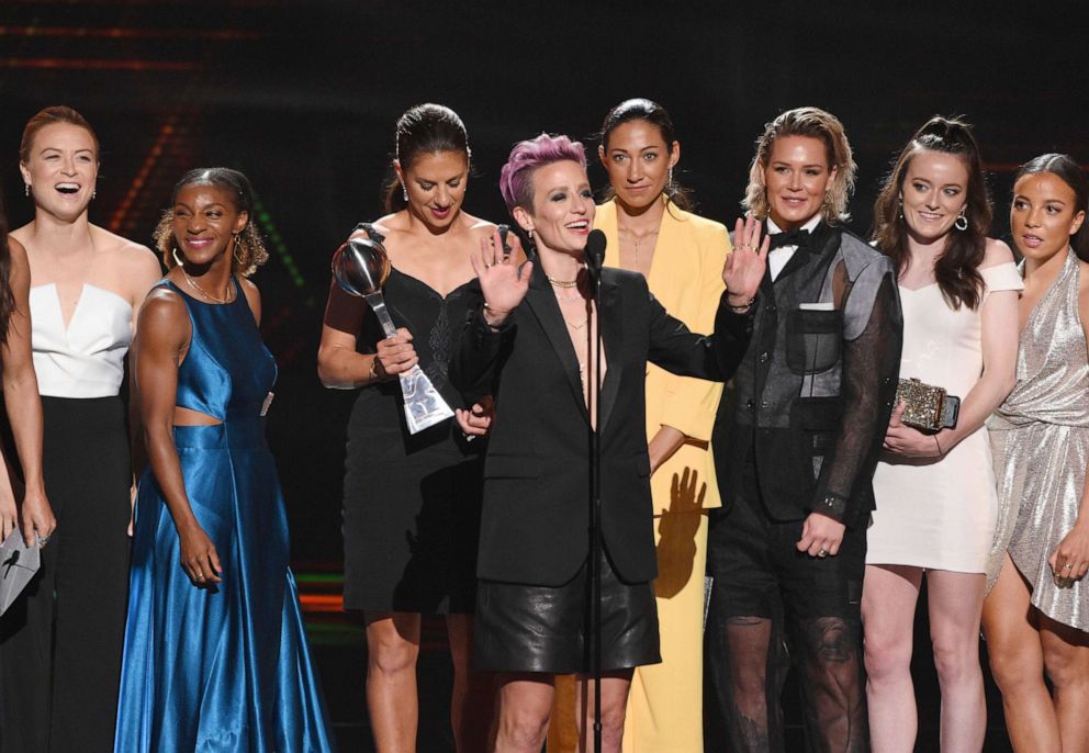 PHOTO: Megan Rapinoe, center, and members of the U.S. women's national soccer team accept the award for best team at the ESPY Awards in Los Angeles, July 10, 2019. 