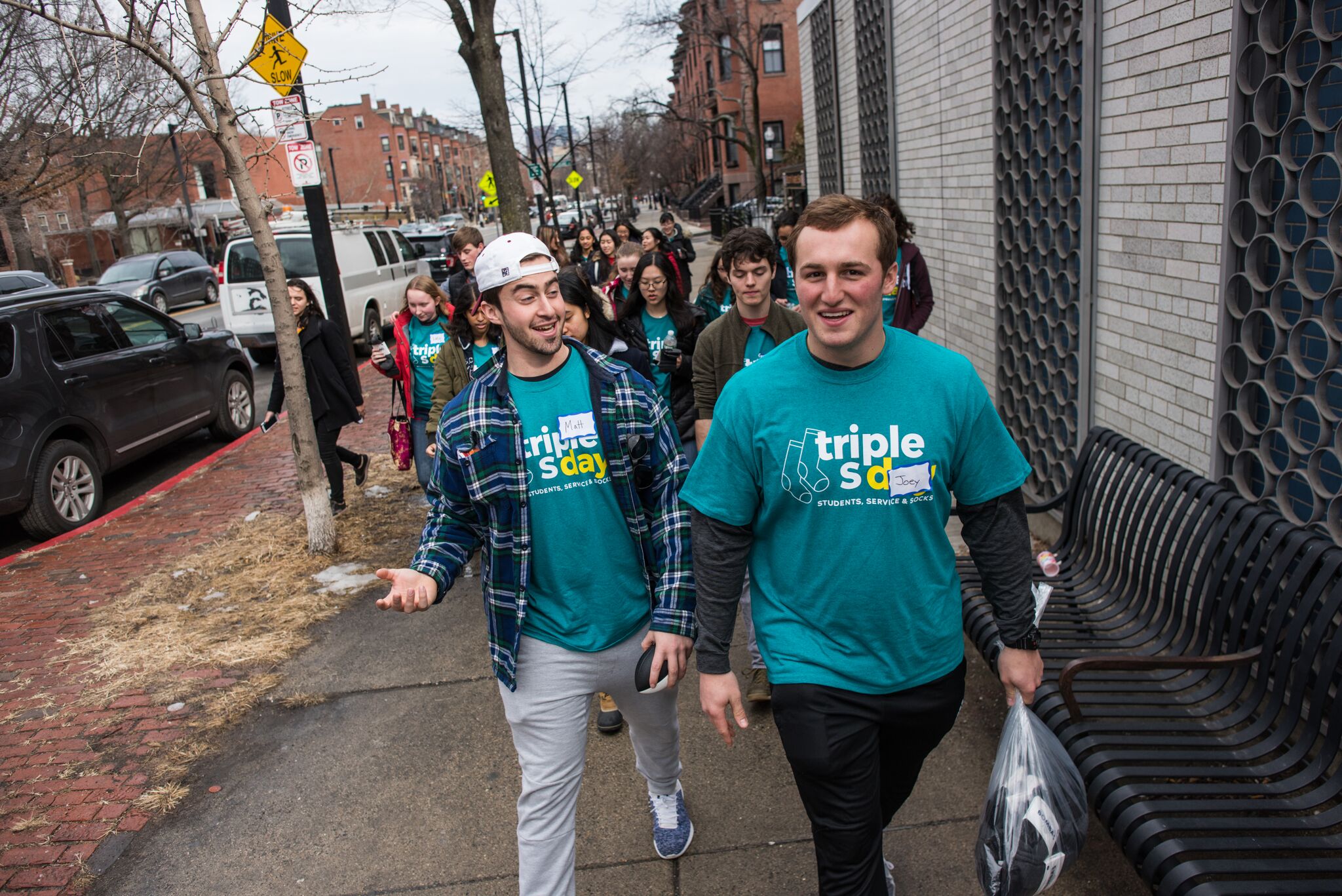 PHOTO: College students walked the streets of Boston delivering 25,000 socks to homeless people.