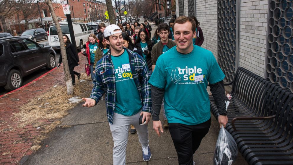 PHOTO: College students walked the streets of Boston delivering 25,000 socks to homeless people.