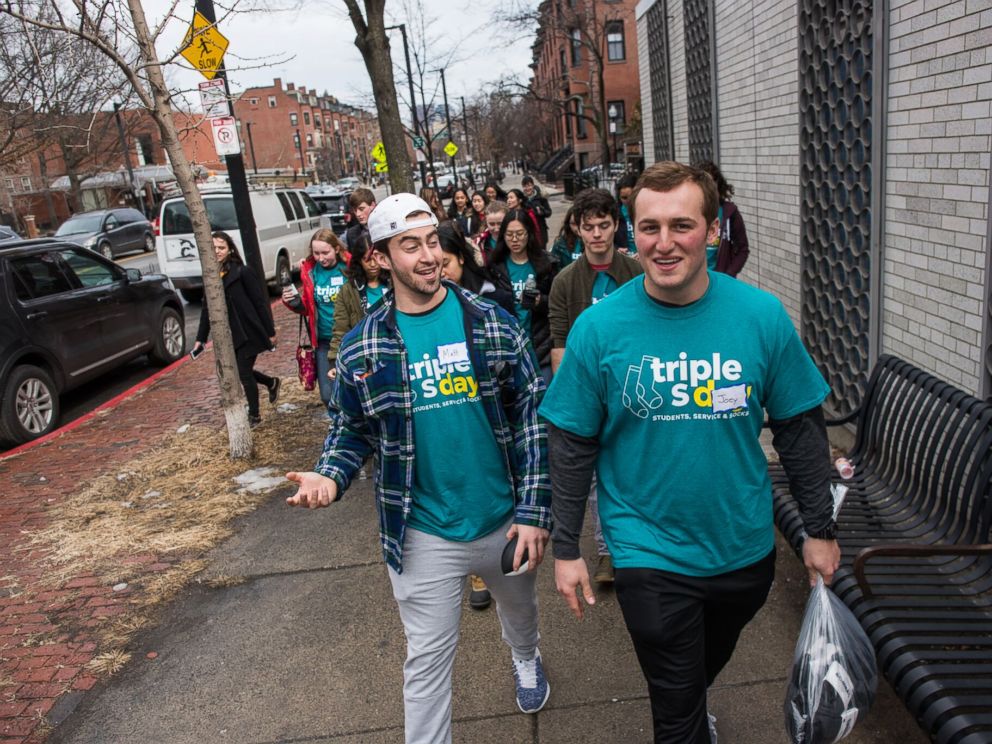 PHOTO: College students walked the streets of Boston delivering 25,000 socks to homeless people.