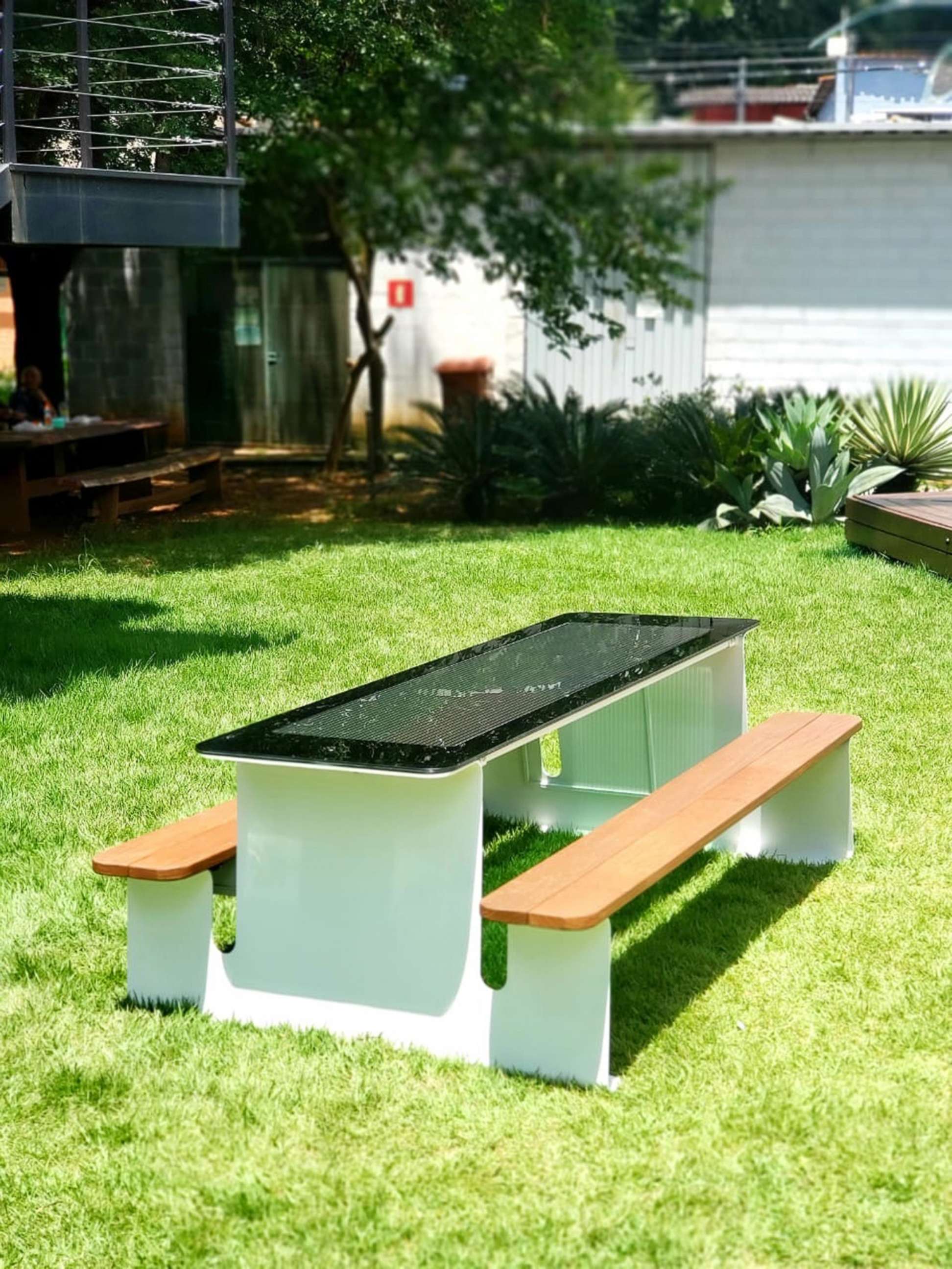 PHOTO: GO-OPV's ORENgE solar power technology is installed on an outdoor table.